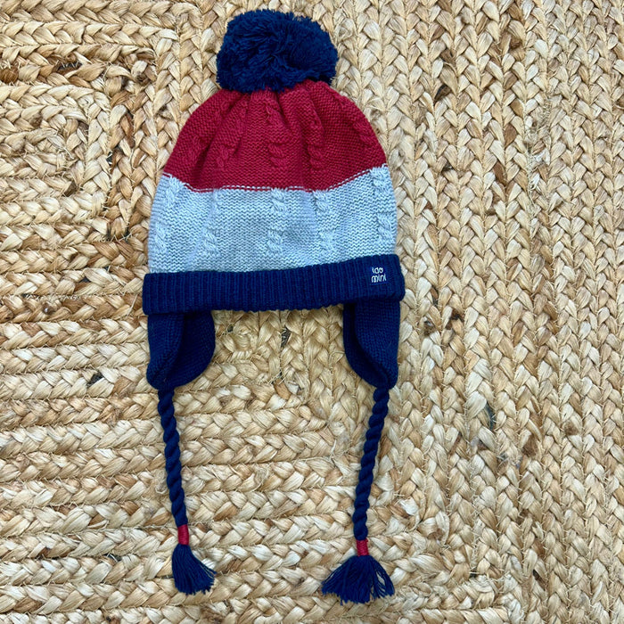 Cappellino bimbo tricolore con pon pon