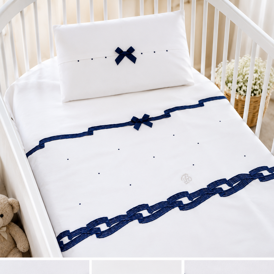 Coordinato copertina sfoderabile con lenzuola neonata in cotone con fiocchi blu