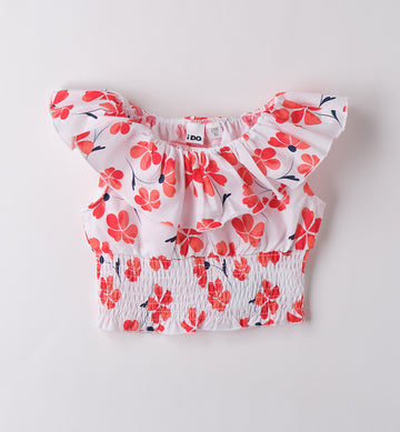 Top estivo per bambina con stampa fiori corallo e balza sulle spalle, vista frontale.
