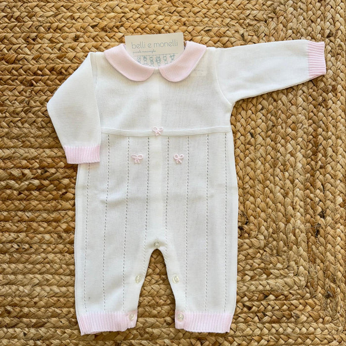Tutina neonata in cotone panna e rosa con fiocchetti applicati