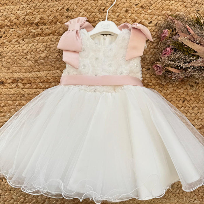 Abito da battesimo bimba avorio con fiocchi rosa e gonna in tulle