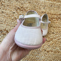 Scarpa per bambina dallo stile raffinato, ideale per occasioni speciali e look chic.