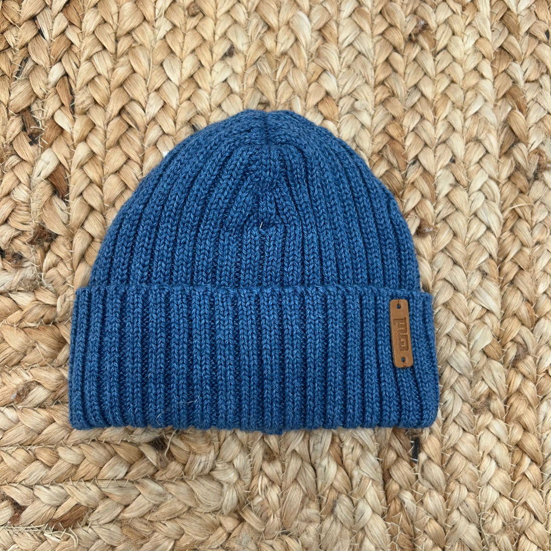 cappello Condor bimbo blu petrolio in maglia a coste con risvolto