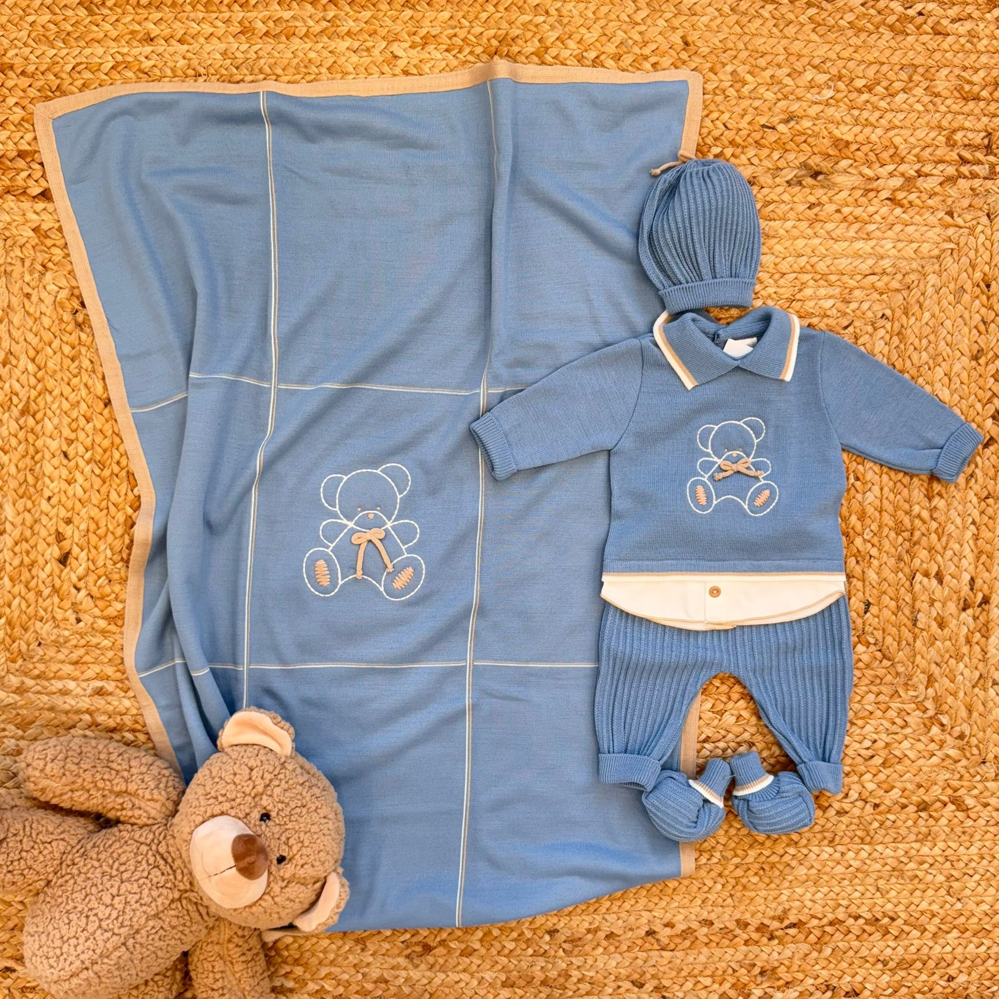 corredino neonato in misto lana azzurro con copertina e accessori
