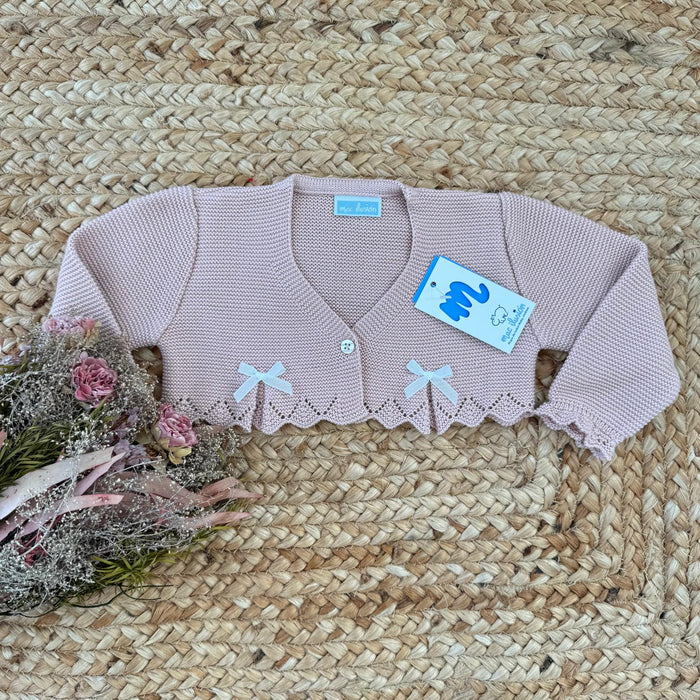 Coprispalle neonata 100% acrilico rosa cipria con fiocchi frontali