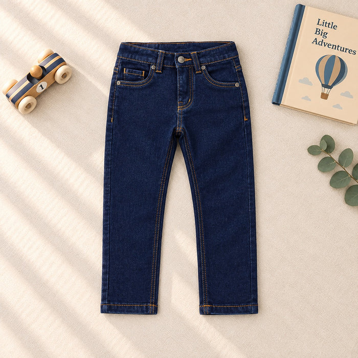 Jeans bambino blu scuro con tasche posteriori e cuciture a contrasto