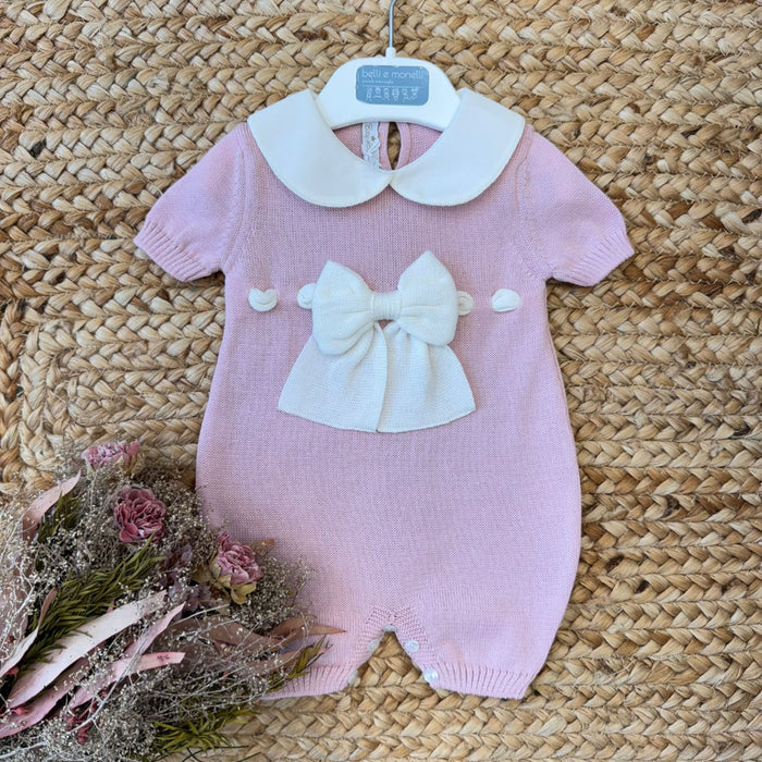 Pagliaccetto neonata rosa in filo di cotone con fiocco centrale