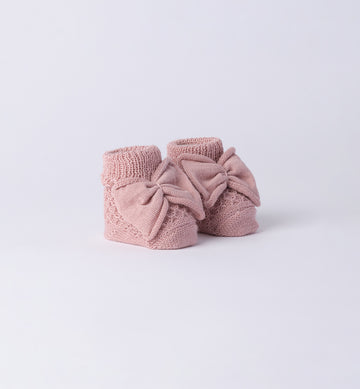 scarpette neonata in caldo cotone rosa con fiocco centrale lavorato a maglia