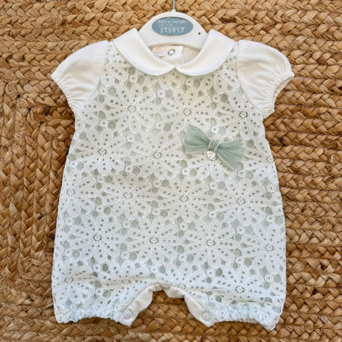 Tutina neonata in cotone con macramè floreale