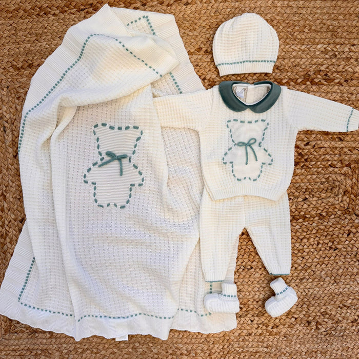 Copertina neonato in lana con ricamo passo nastro verde