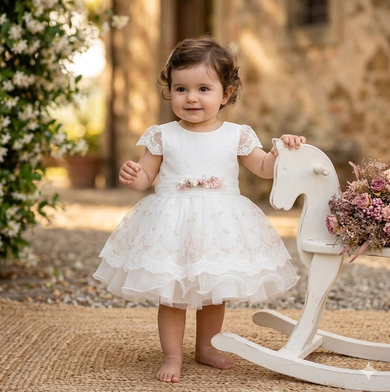 Abiti Battesimo bimba eleganti in tulle, pizzo e mikado. Scopri le collezioni Mimilù, Bufi, Minibanda e altri brand esclusivi su Belli e Monelli.