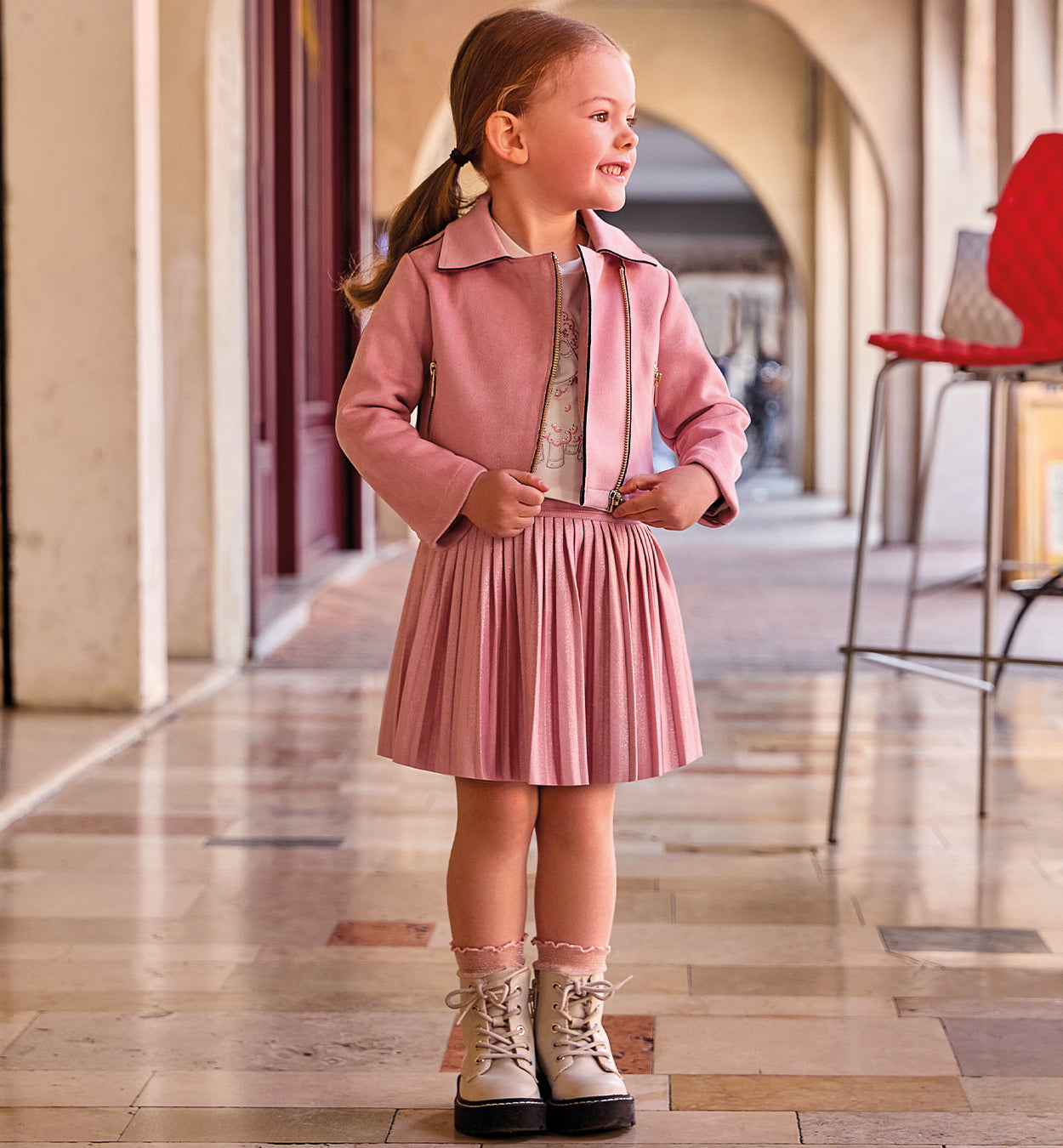 Completo bimba con maglia fiocchi e gonna plissé rosa