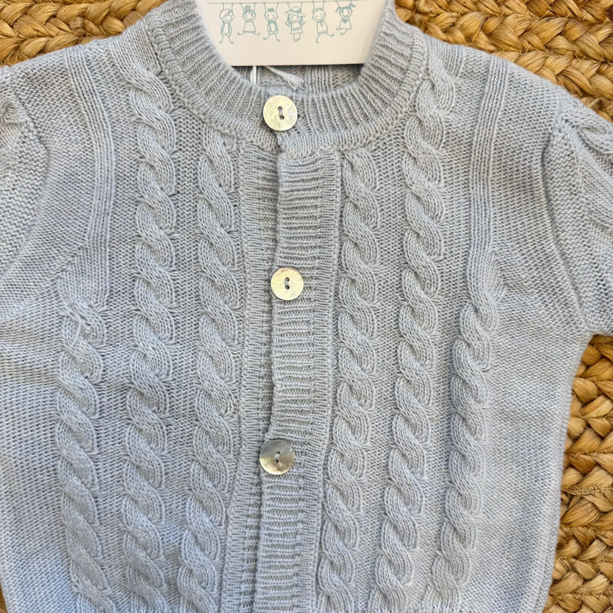 Cardigan neonato azzurro in lana e cashmere