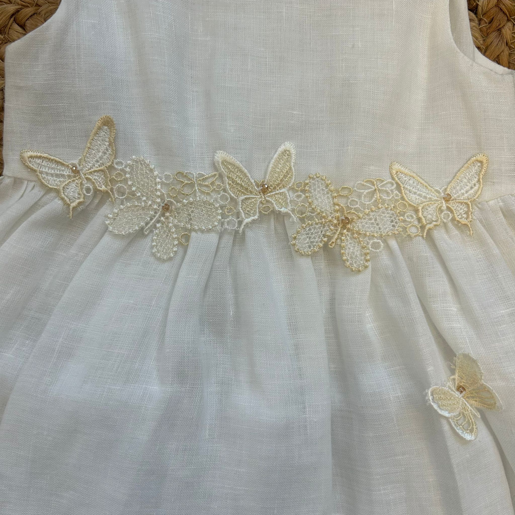 ABITO LINO AVORIO CON FARFALLE