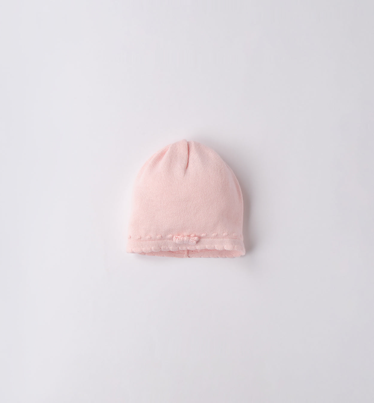 Cappellino neonata in lana-cotone rosa con fiocco