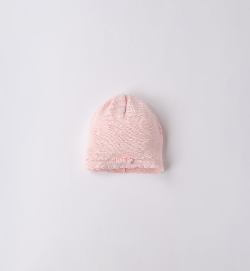 Cappellino neonata in lana-cotone rosa con fiocco