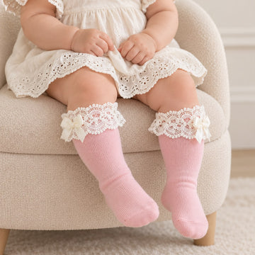 Calzettoni neonata rosa con pizzo e fiocco in raso