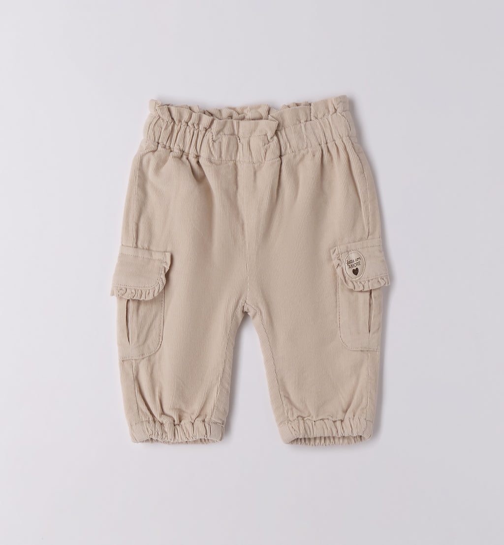 Completo bimba rosa con cardigan e pantaloni beige
