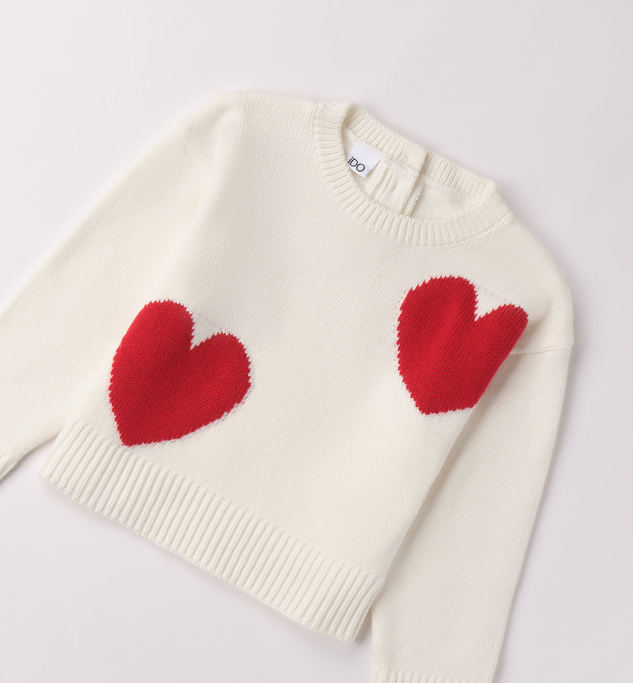 Maglione panna con cuori rossi bambina
