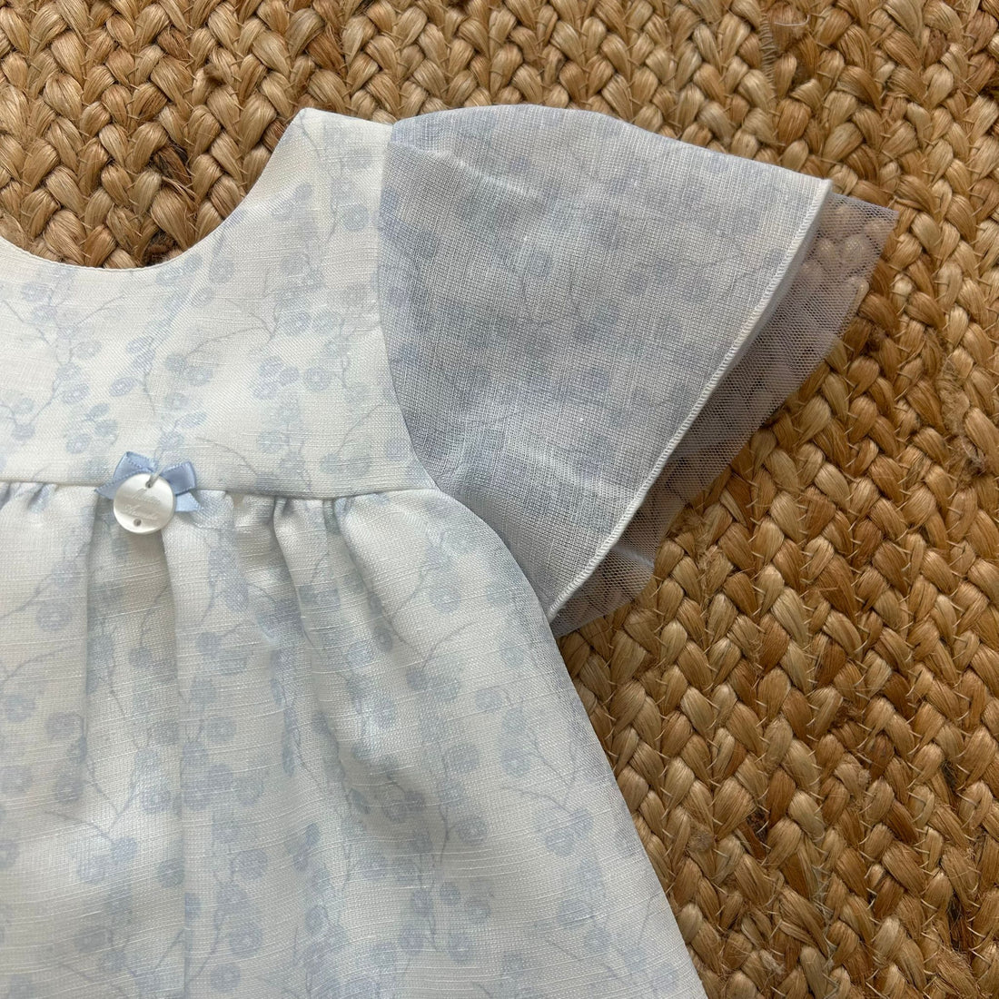 Abito bambina estivo in lino bianco con stampa floreale azzurra