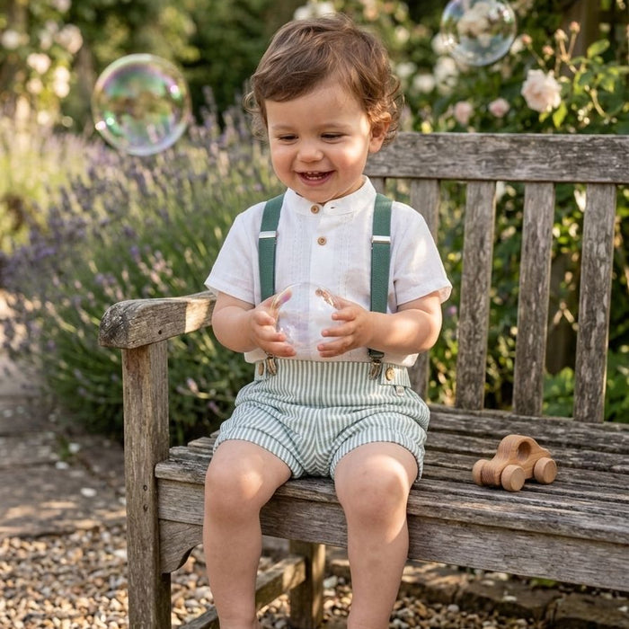 Completo bimbo elegante con bretelle