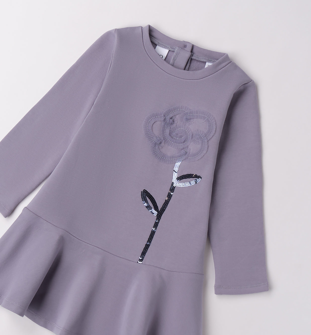 Abito bambina lilla svasato con balza e ricamo floreale