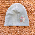 Cappellino neonata in ciniglia verde salvia con ricamo floreale
