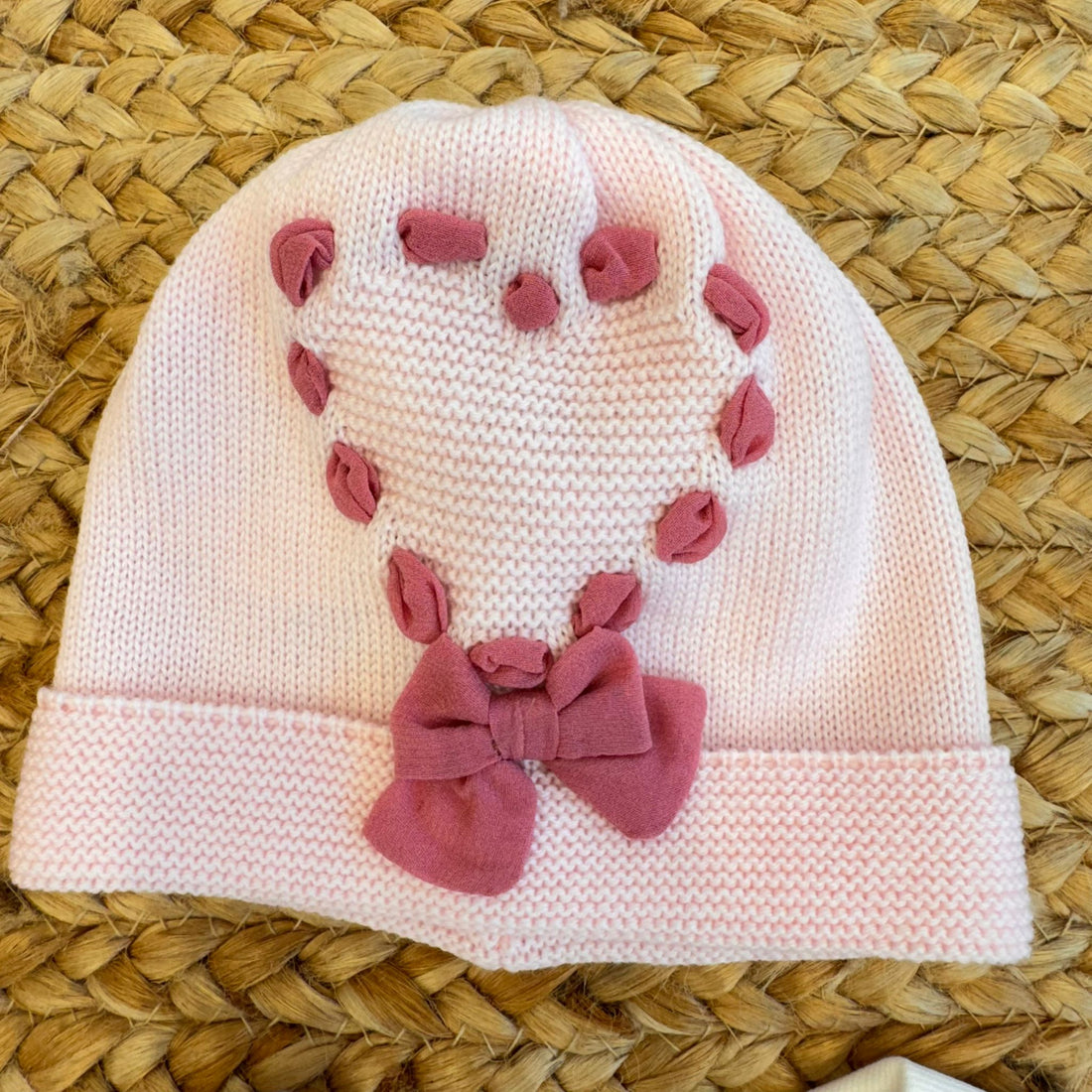 Coordinato neonata rosa in pura lana con fiocchi ciclamino.
