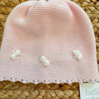 Cappellino rosa in pura lana per neonata con fiocchetti ricamati a mano