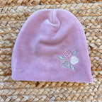 Cappello neonata in ciniglia rosa con ricamo floreale