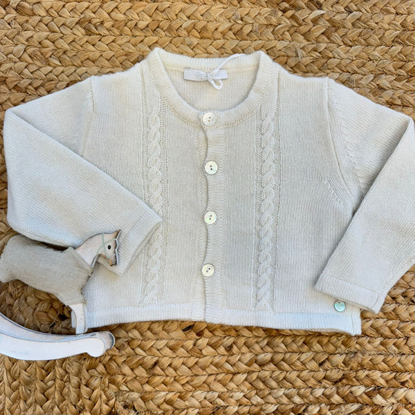 Cardigan neonato panna con trecce sottili e bottoni madreperla