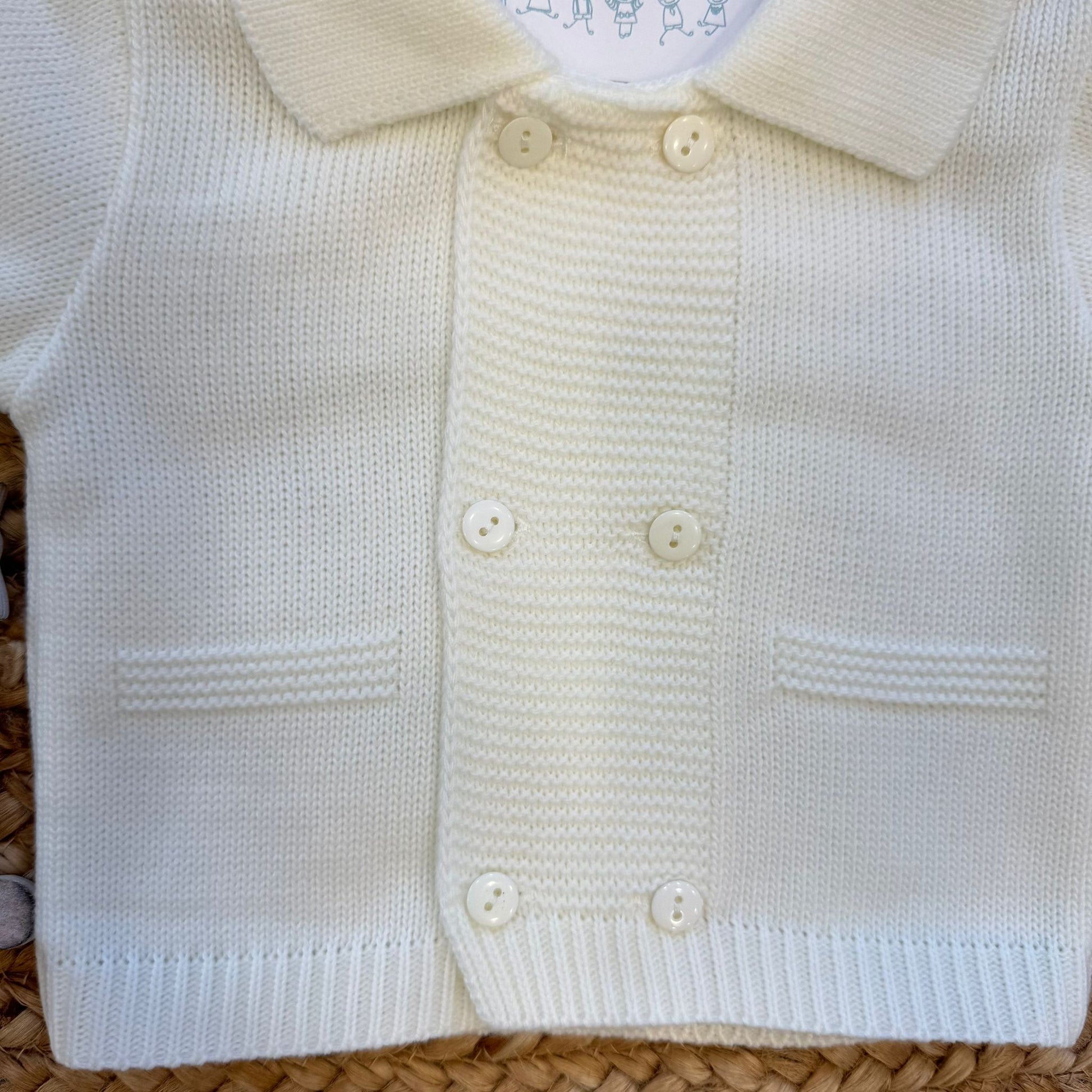 Cardigan panna elegante per neonato