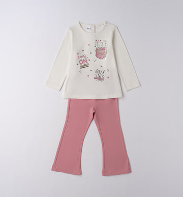 Completo bambina in cotone con maglia bianca e pantaloni rosa.