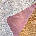 Coperta in ciniglia rosa con interno fantasia floreale