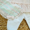 Cuffietta coordinata con righe pastello e fiocco per neonata