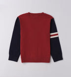 Dettaglio cardigan bambino rosso e blu navy con bottoni