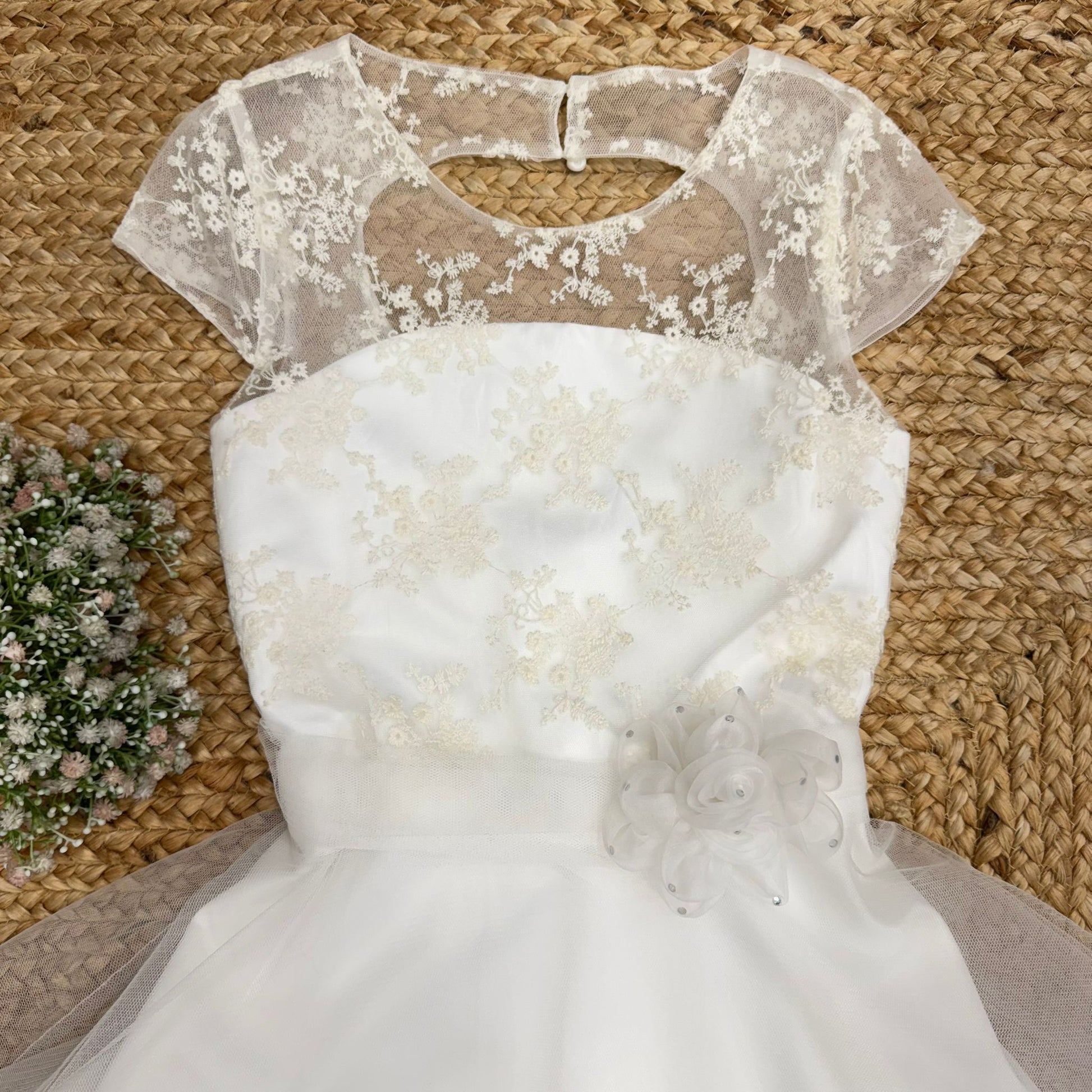 Dettaglio corpetto in pizzo e tulle ricamato