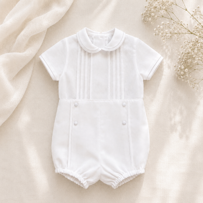 Pagliaccetto battesimo bimbo in cotone e lino bianco con pieghe sartoriali