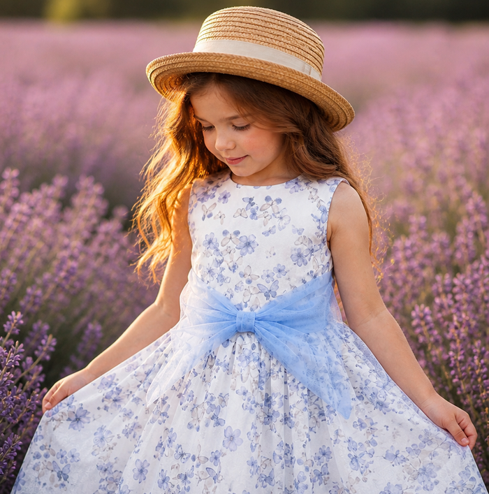 Abito bimba elegante con fiocco azzurro e stampa farfalle