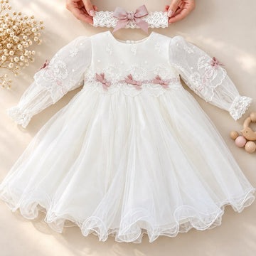 Abito battesimo bimba in tulle ricamato con fiocchi rosa