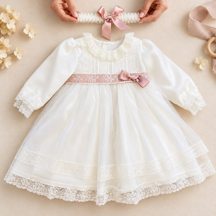 Abito battesimo bimba in tulle e pizzo con fiocco rosa cipria
