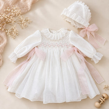 Abito battesimo bimba con smock e fiocchi rosa