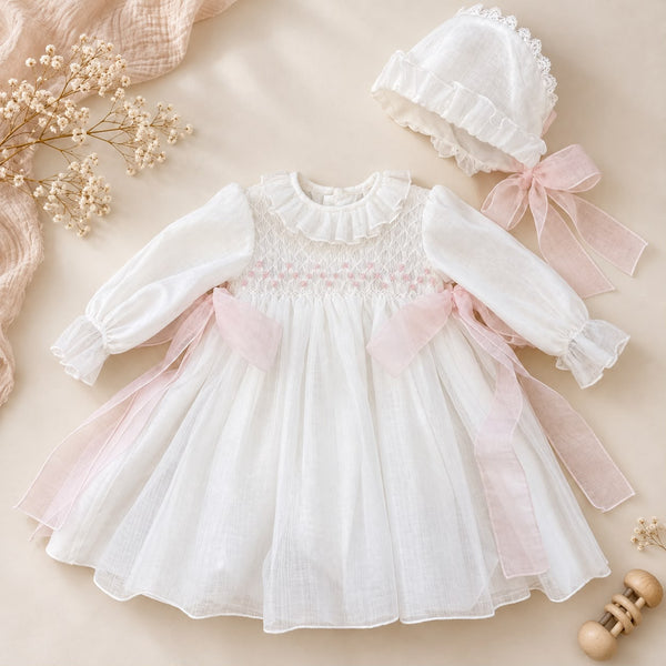 Abito battesimo bimba con smock e fiocchi rosa