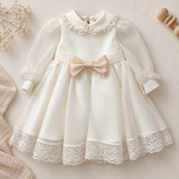 Abito battesimo bimba in organza e pizzo con fiocco rosa cipria
