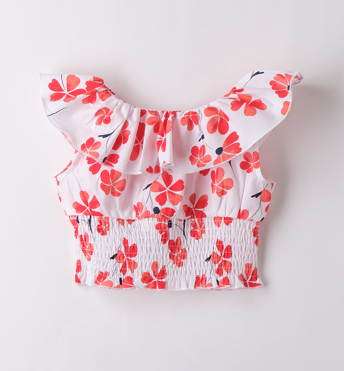 Top estivo per bambina con stampa fiori corallo e balza sulle spalle, vista frontale.