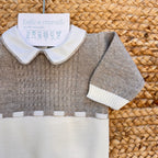 Retro della tutina neonato misto lana con bottoncini