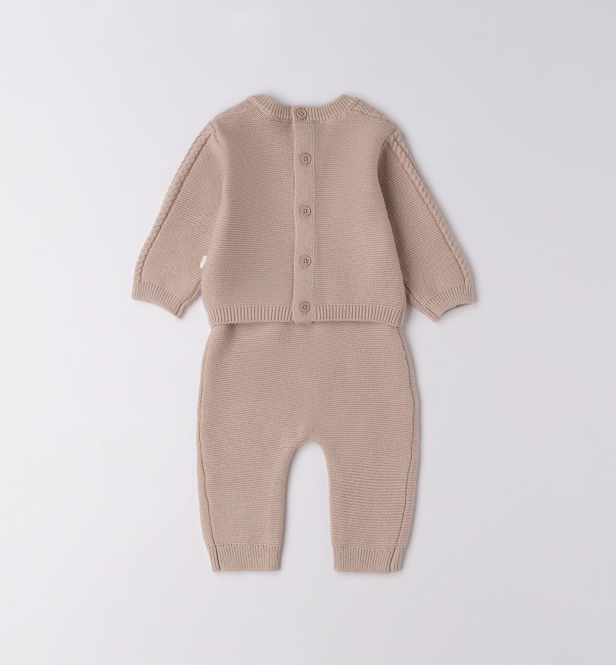 Retro della tutina unisex in cotone e lana con abbottonatura a bottoni.