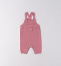 Salopette in maglia rosa con fiocchetto neonata