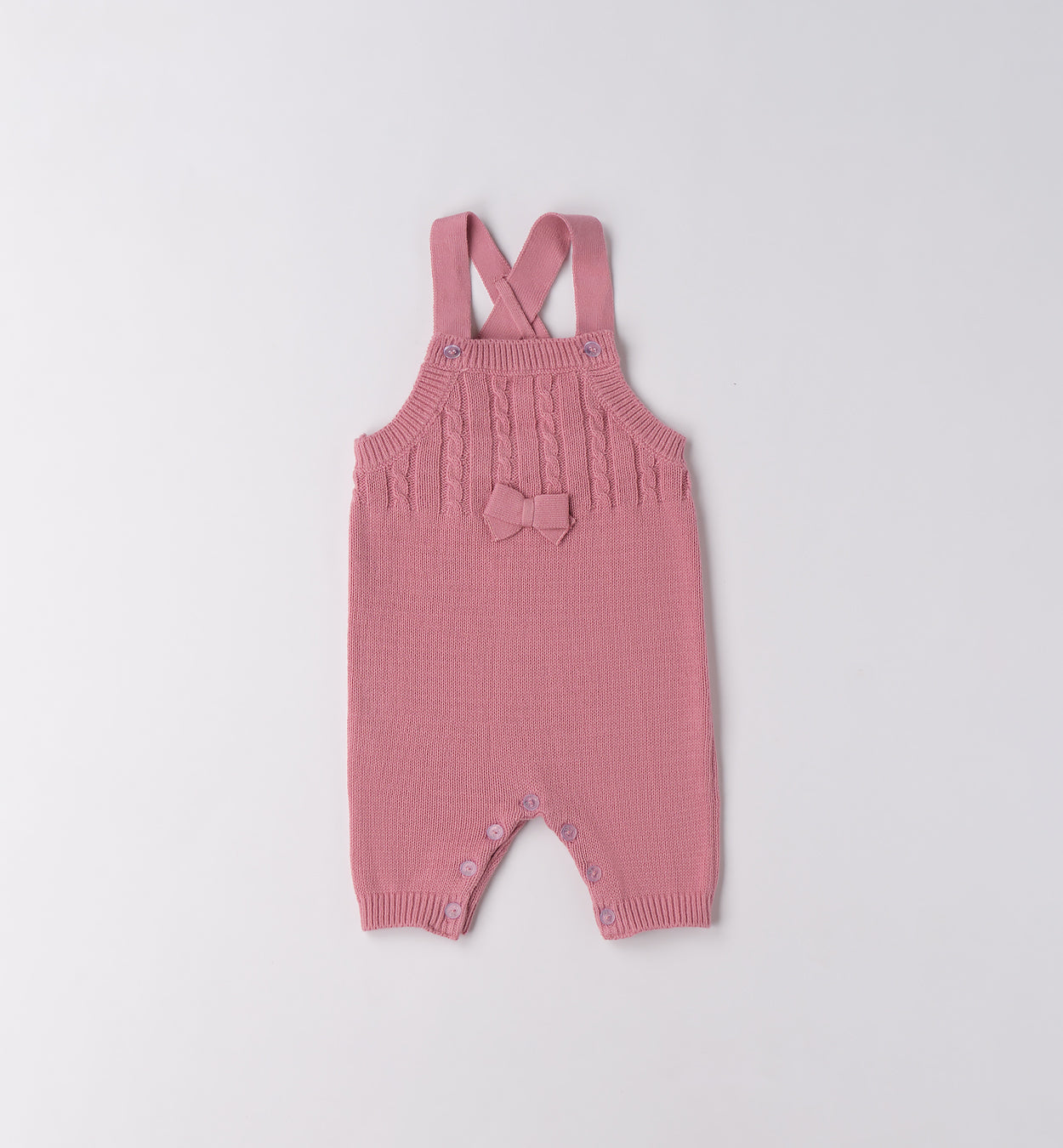 Salopette in maglia rosa con fiocchetto neonata