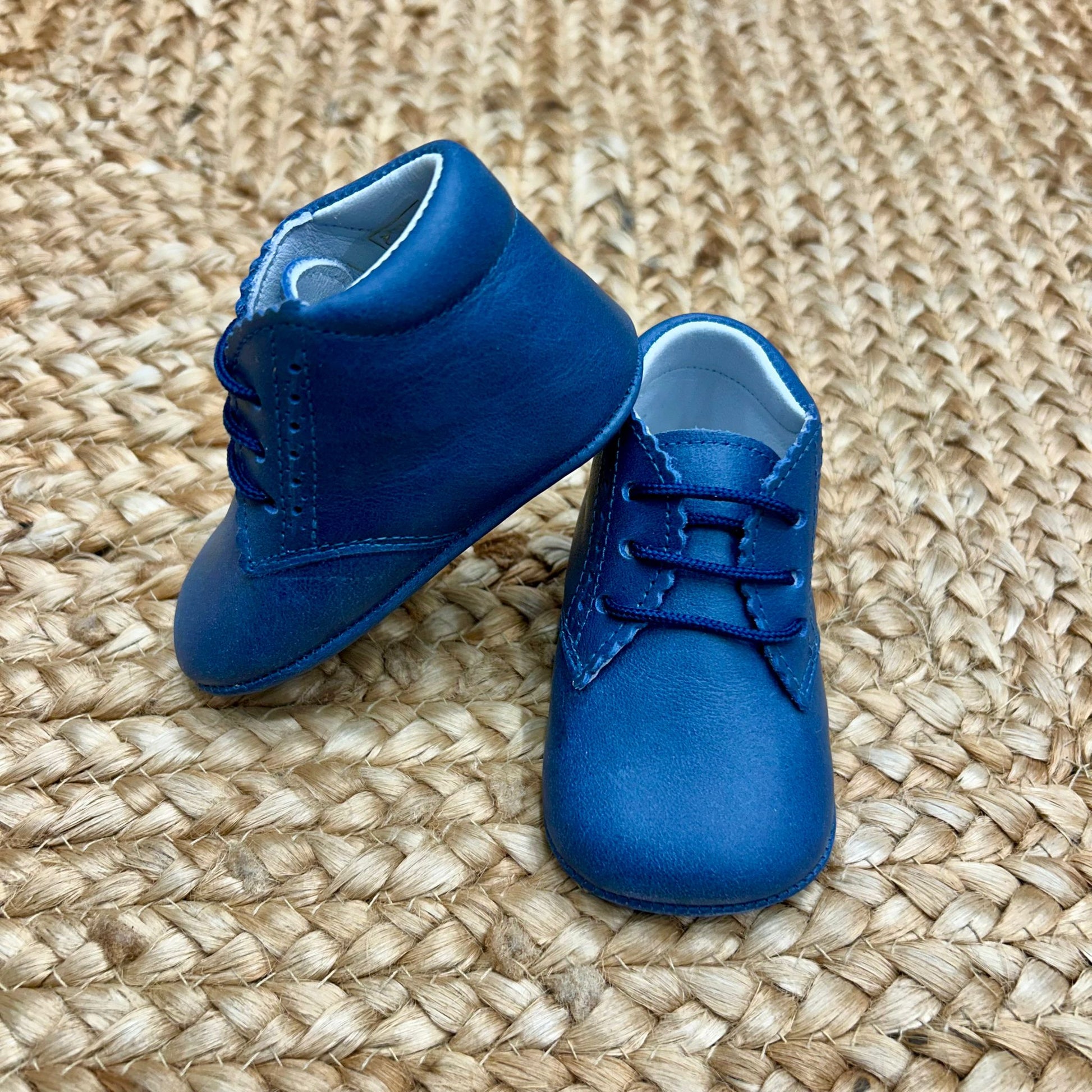 Scarpe battesimo bambino blu vista laterale